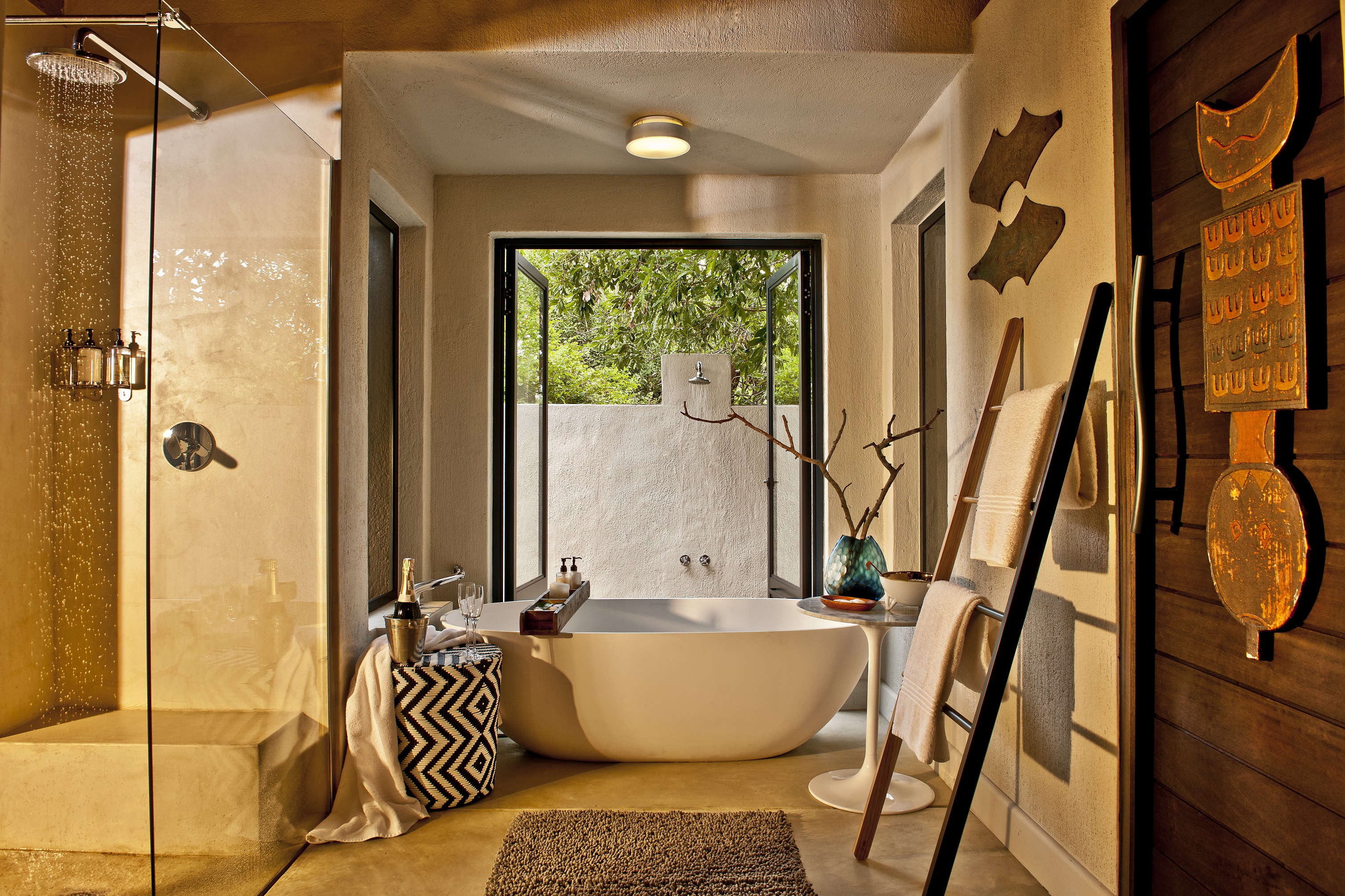 <p>The bathrooms at Little Bush Camp in Sabi Sabi are luxurious and beautifully designed, offering guests a private and comfortable space to relax and refresh after a day of safari adventures.</p>